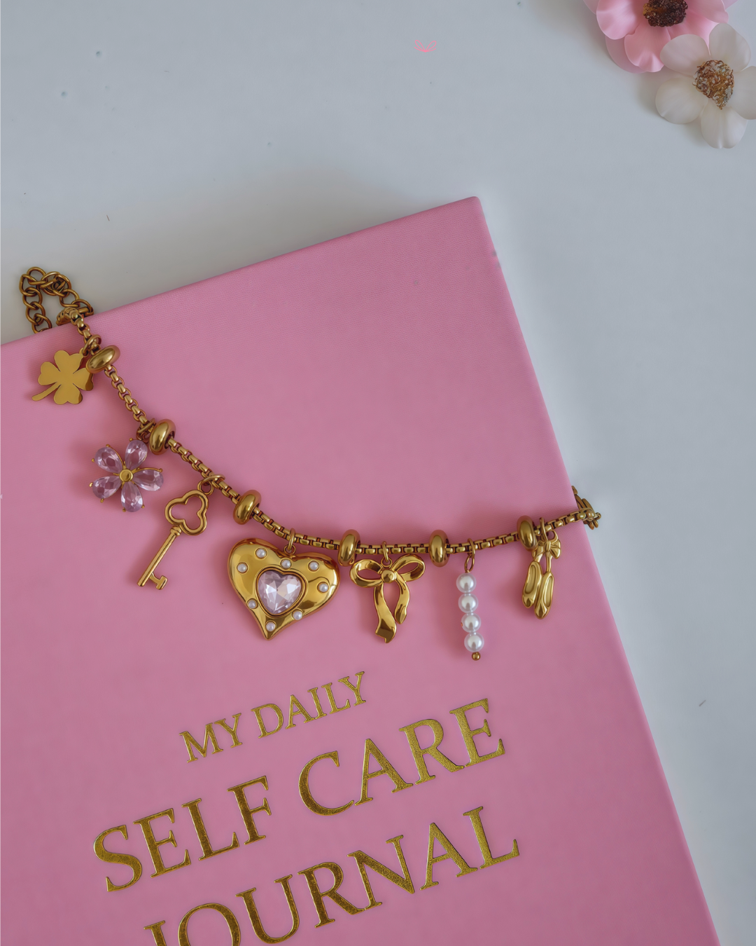 The Rayne Muse Charm Edit